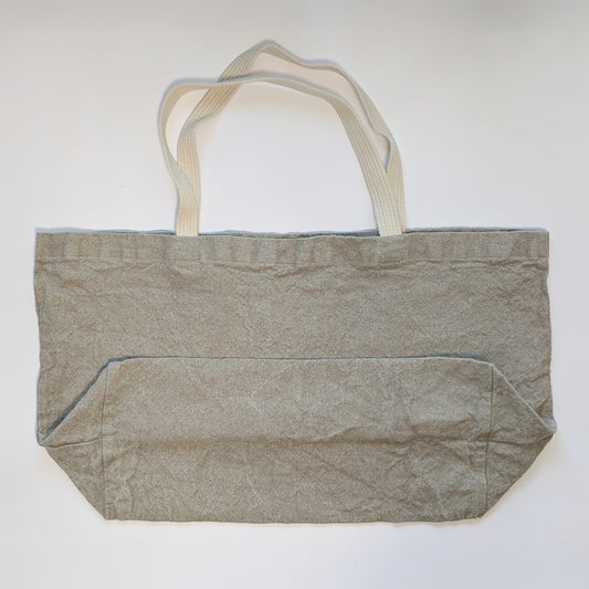 Bottom gusset detail of Doudou tote showing wide base for stability and volume