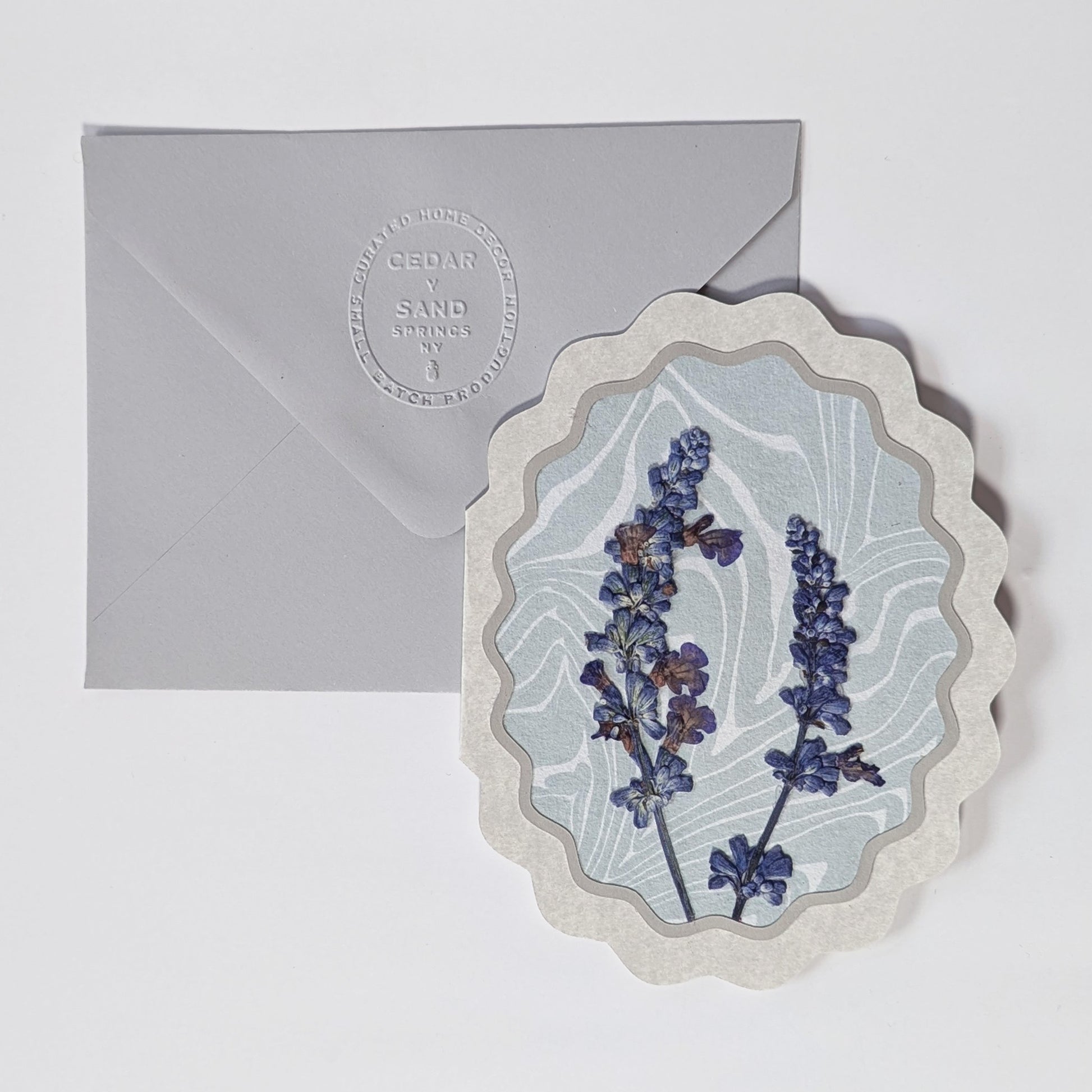 Flora of Affection notecards in Lavender colorway featuring pressed lavender florals on blue-gray Suminagashi background