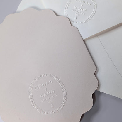 Flora of Affection petal notecard and envelope with blind-embossed CEDAR Y SAND mark
