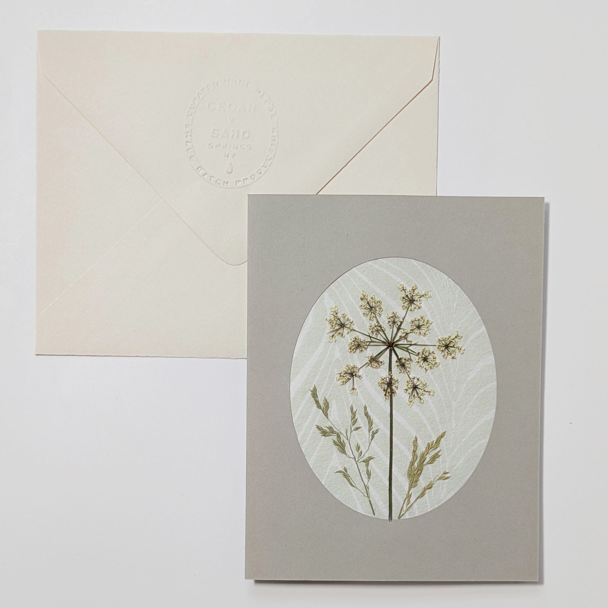 Handmade Suminagashi notecard with pressed yarrow bloom and delicate grasses on marbled Hosho paper with embossed envelope