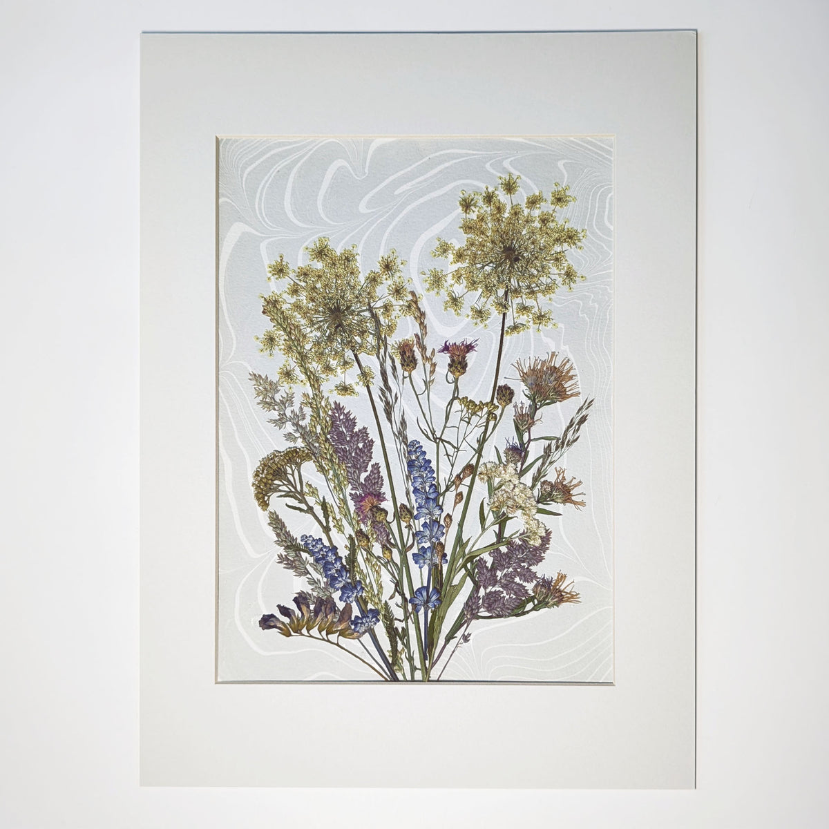 Dune Bouquet one-of-a-kind pressed botanical composition with East Hampton wildflowers and grasses over pale hand-marbled Suminagashi, matted 12 x 16 inches.