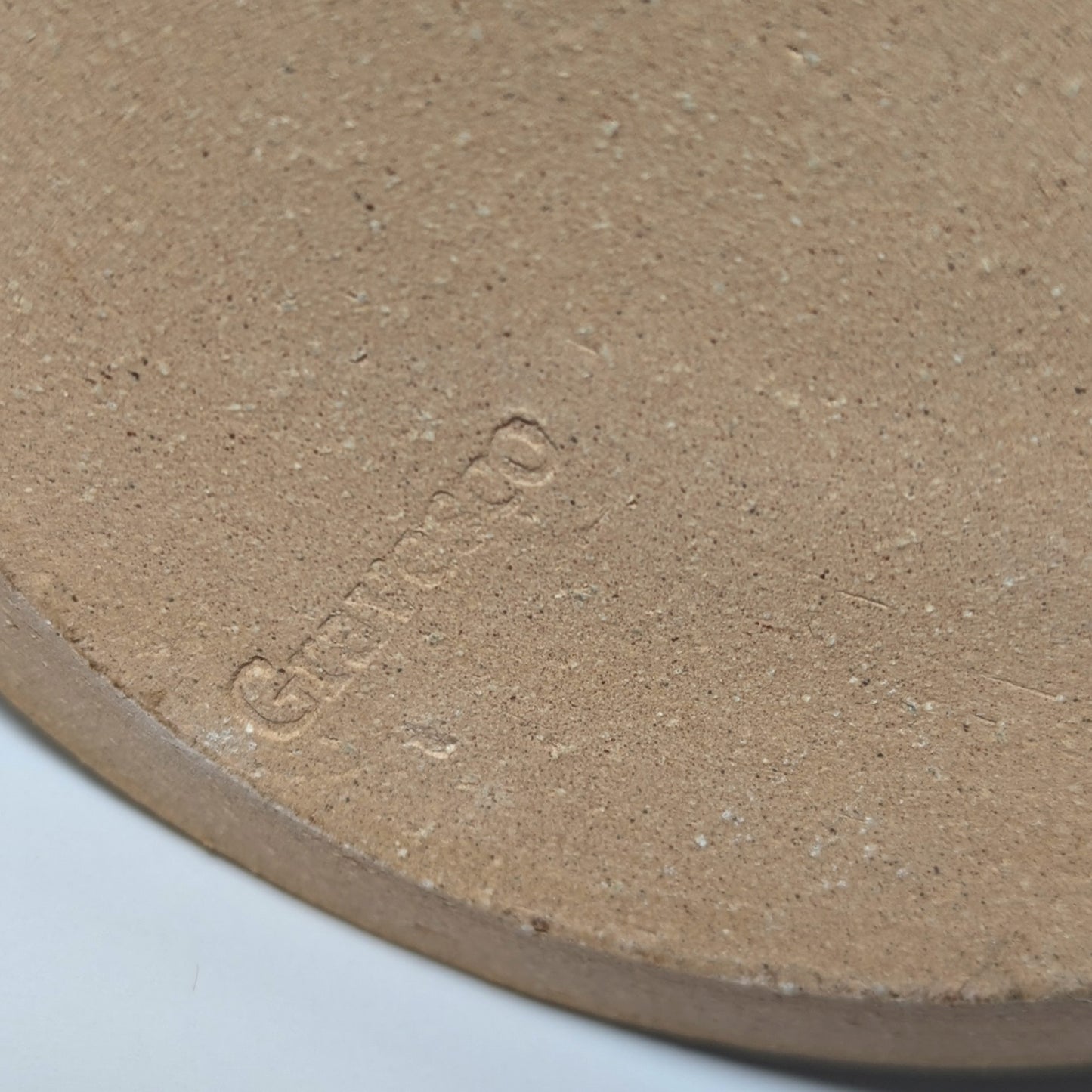 bottom of mug with the Gravesco embossed insignia stamp