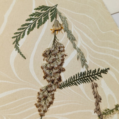 Pressed floral “A” initial notecard with neutral grasses and botanicals on marbled Suminagashi paper, handmade on Fabriano Medioevalis cardstock