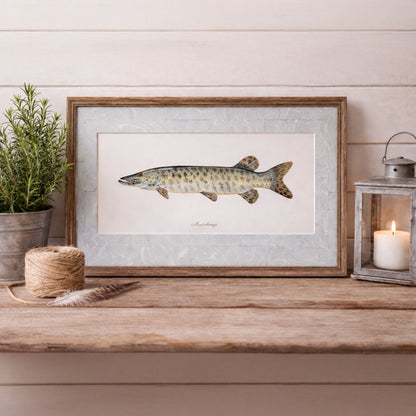 Framed muskellunge watercolor artwork displayed on rustic wood table with coastal decor and candle