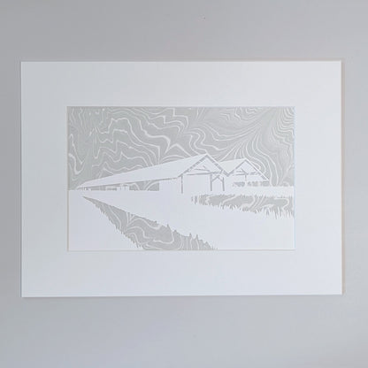 Parrish Art Museum paper silhouette art with fog-gray marbled background, mounted in white archival mat.