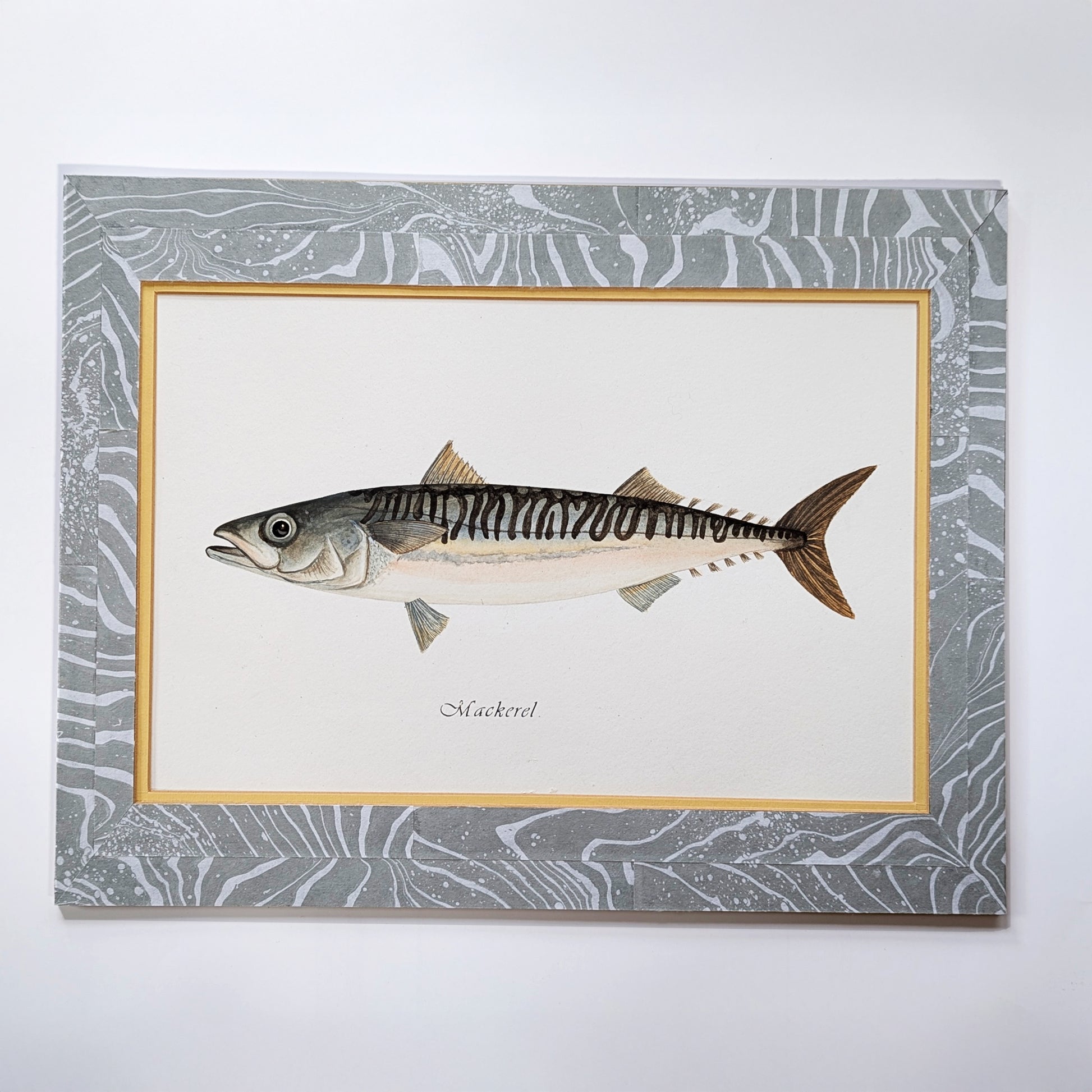 Straight-on view of the full double-matted Mackerel artwork against a clean white background, showing marbled mat and centered portrait.